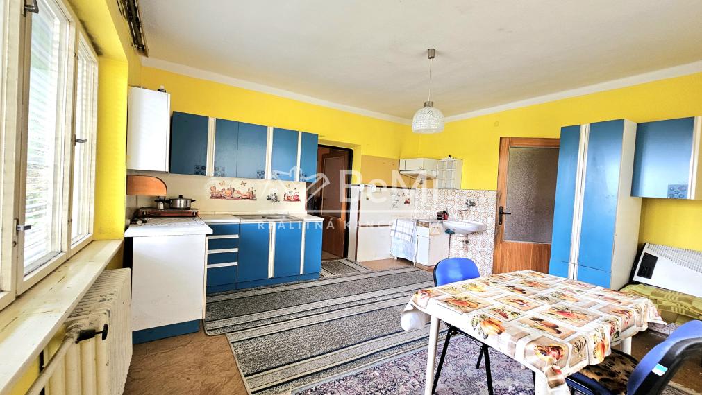 RODINNÝ DOM S GARÁŽOU A ZÁHRADOU V RAKYTNÍKU - NA PREDAJ