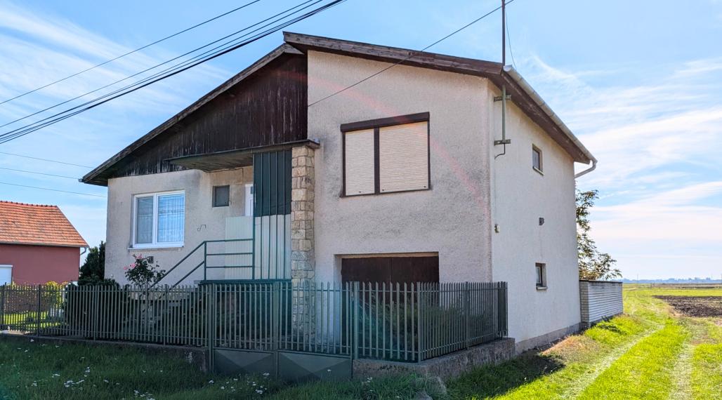 Predaj, rodinný dom - Veľké Kozmálovce (1229-12-AFI)