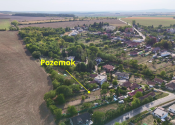 Na predaj stavebný pozemok v obci Urmince  ID 233-14-LUGUE - fotografia 2