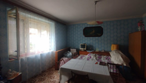 Na predaj rodinný dom s veľkým pozemkom v obci Nemčiňany - fotografia 1