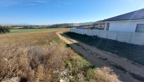 Na predaj stavebný pozemok v obci Krnča ID 235-14-LUGUE - fotografia 2