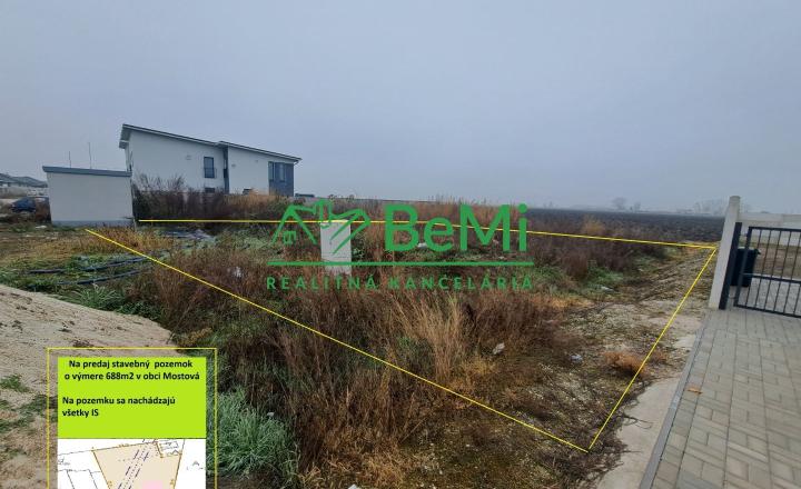Stavebný pozemok - 688m2, Mostová ID 012-14-EVBA