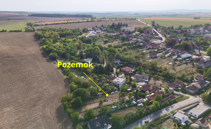 Na predaj stavebný pozemok v obci Urmince  ID 233-14-LUGUE - fotografia 1
